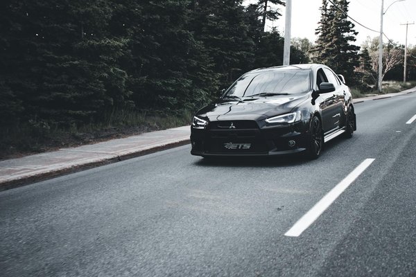 Comment choisir un système de portage pour transporter des vélos sur une voiture de sport?